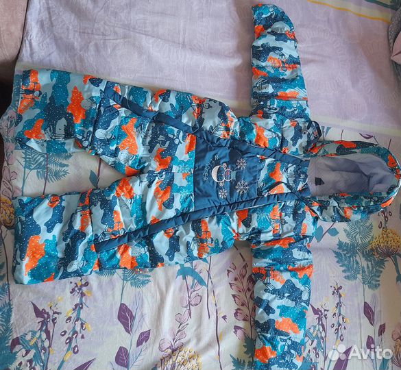 Продам зимние комбинезоны б/у