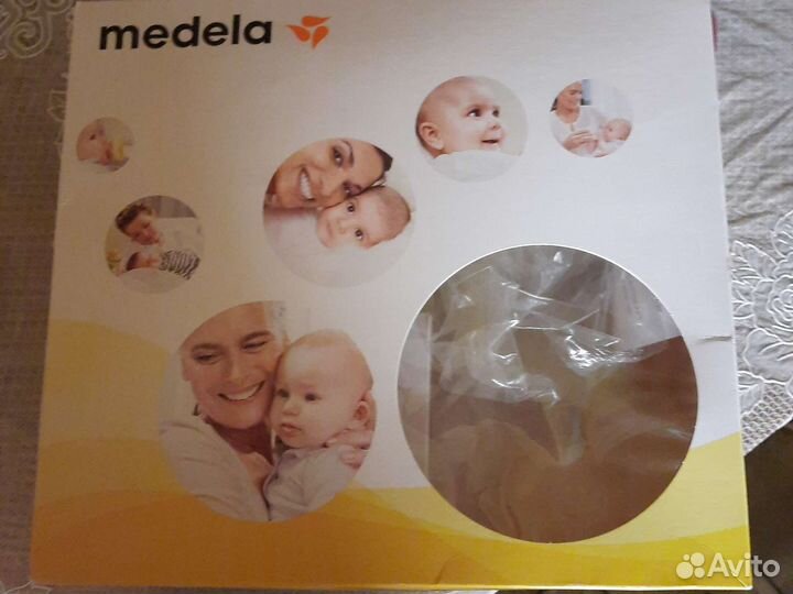 Молокоотсос medela электрический