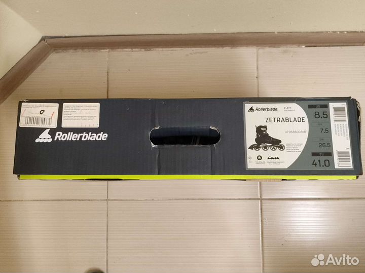 Роликовые коньки