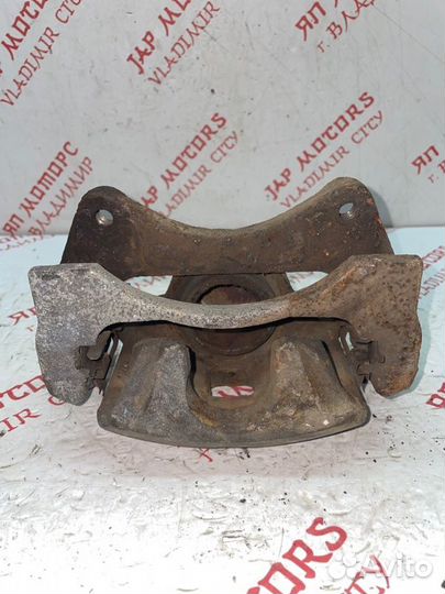 Суппорт тормозной передний левый Mitsubishi