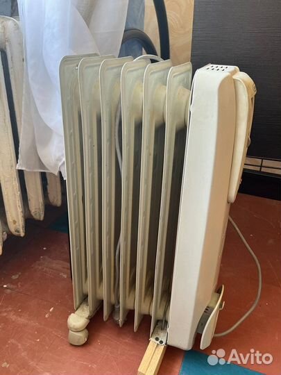 Масляный обогреватель delonghi