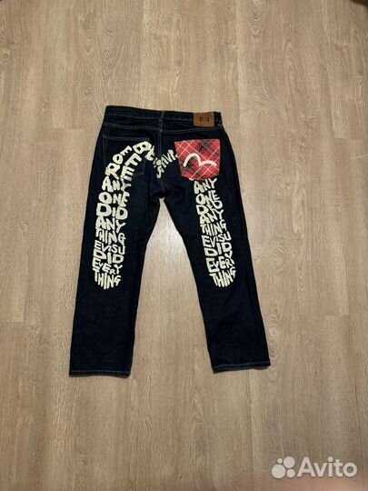 Джинсы Evisu