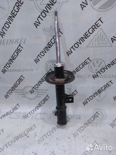 Стойка амортизатор передняя левая Kia Sportage 3