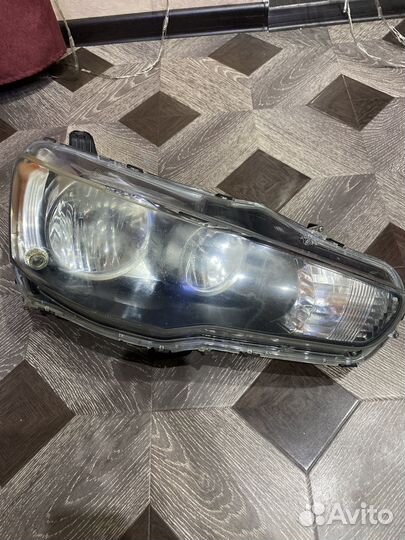 Фара передняя левая mitsubishi lancer 10