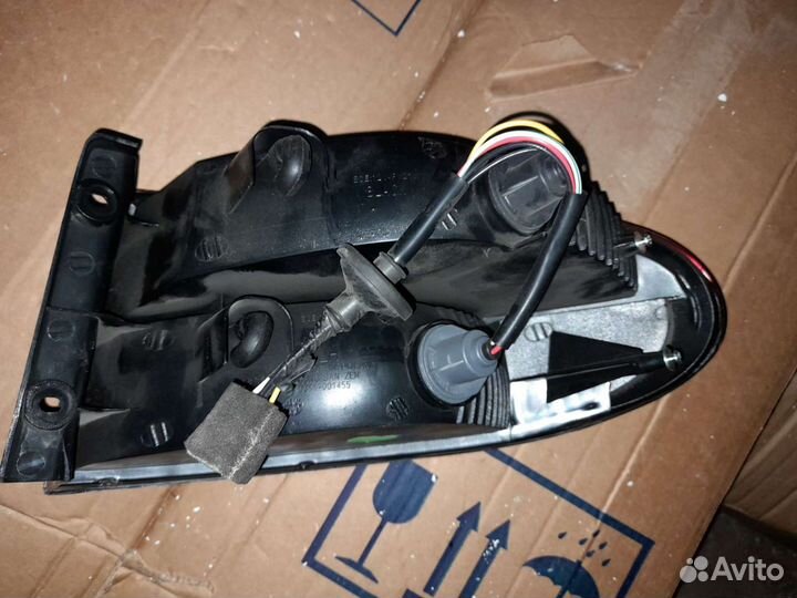 Фонарь задний наружный на chevrolet lanos (2004)