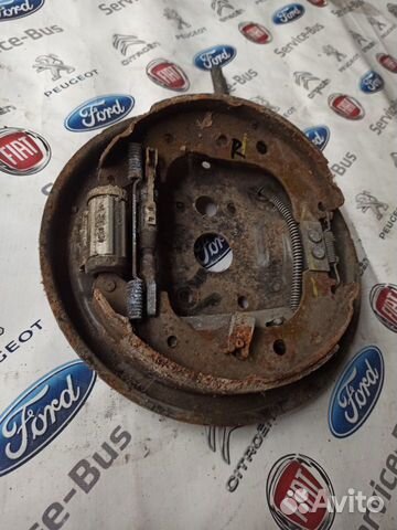 Механизм заднего тормоза (правый) fiat doblo.2012г