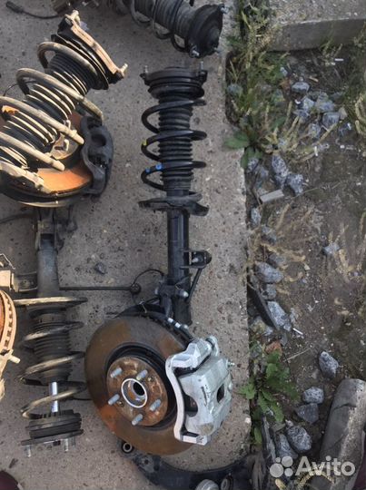 Амортизатор передний Киа Спортейдж 4