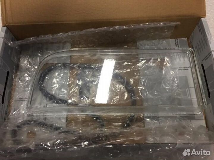 Стекло фары левое Mercedes-Benz Мерседес Axor