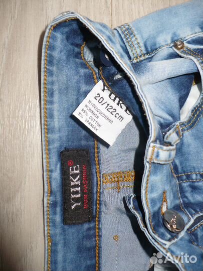 Джинсы голубые