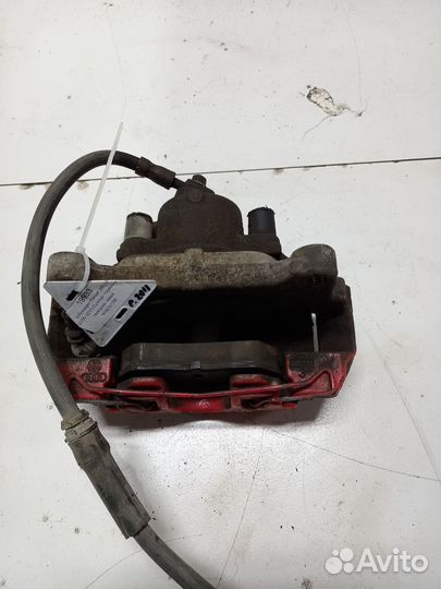 VW Passat (B6) Vl суппорт тормозной передний левый