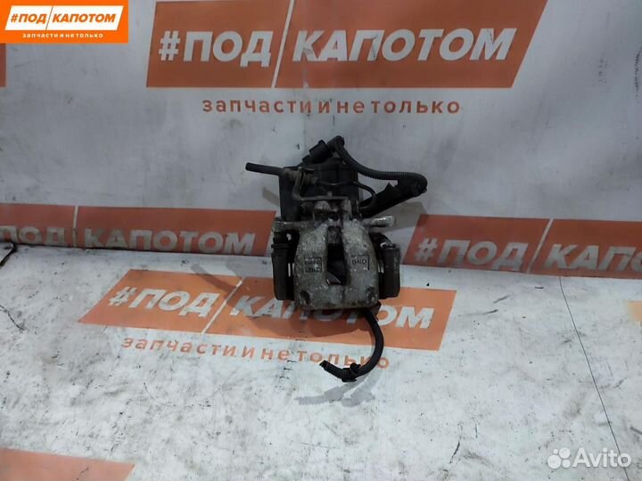 Суппорт тормозной задний правый Volkswagen Passat