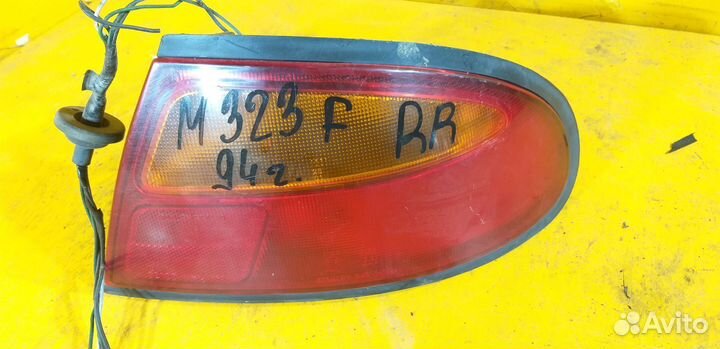 Фонарь задний правый для Mazda 323 1994г