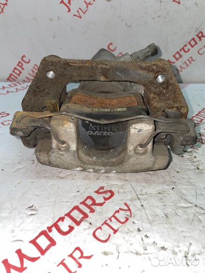 Суппорт тормозной задний правый Volvo V40 хетчбек