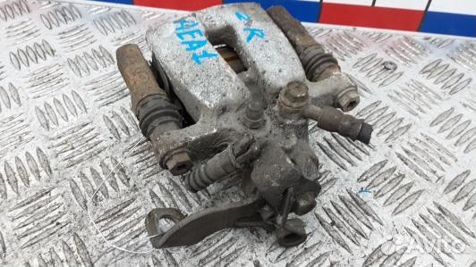 Суппорт тормозной задний правый KIA CEE'D 2 (JD)