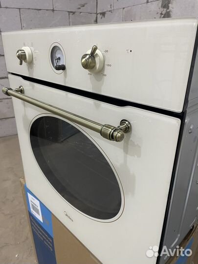 Новый духовой шкаф Midea