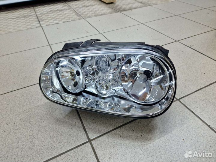 Фара передняя левая VW Golf 4 новая TYG