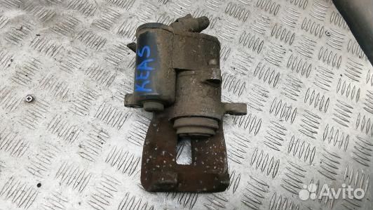 Суппорт тормозной задний левый volkswagen passat B