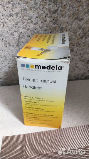 Молокоотсос ручной medela