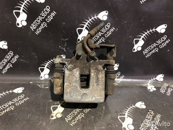 Суппорт тормозной задний левый Kia Soul 1.6 G4FD