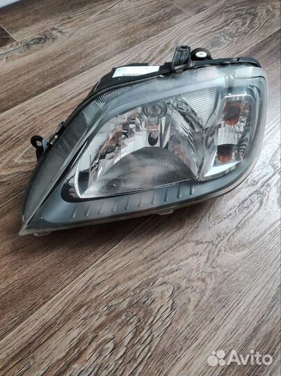 Фара передняя левая reno