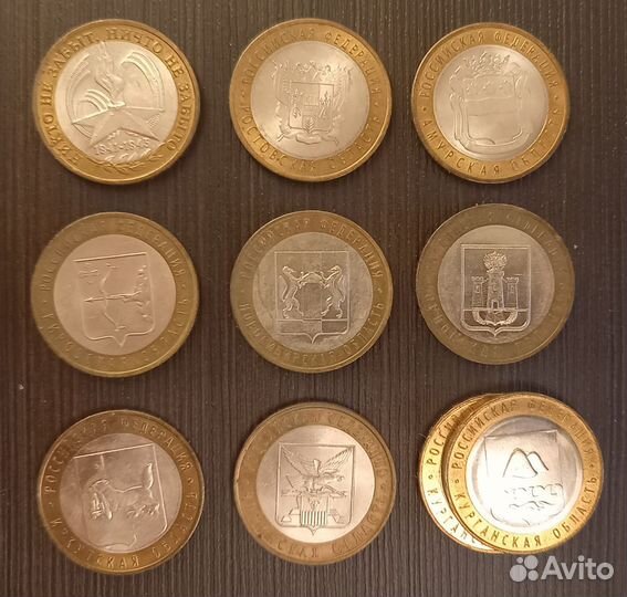 Жетоны монеты юбилейные десятирублевые биметалл