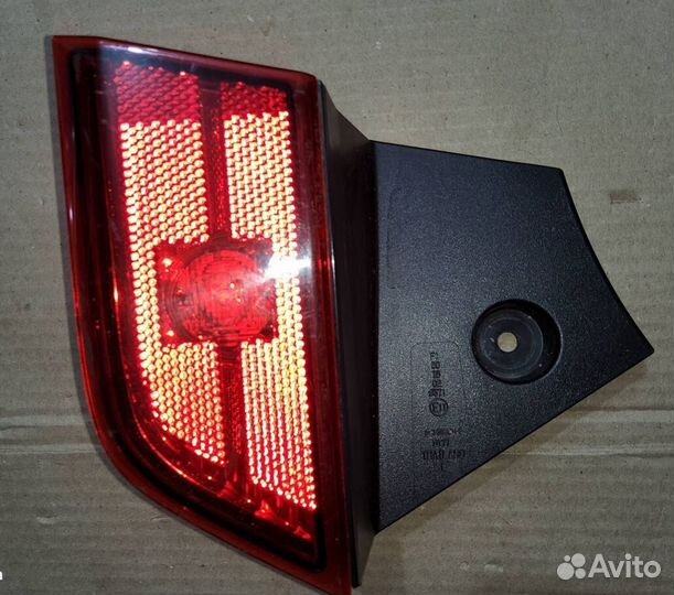 Фонарь задний в бампер левый Mitsubishi Pajero Spo