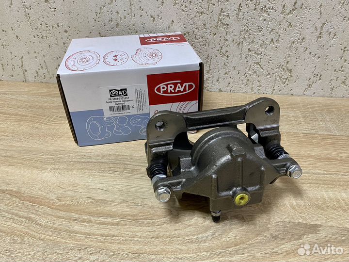 Суппорт левый на Газель