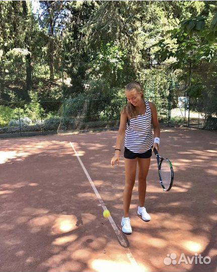 Тренер по большому теннису