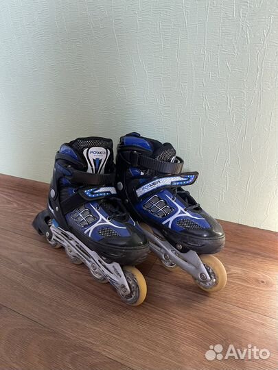 Роликовые коньки