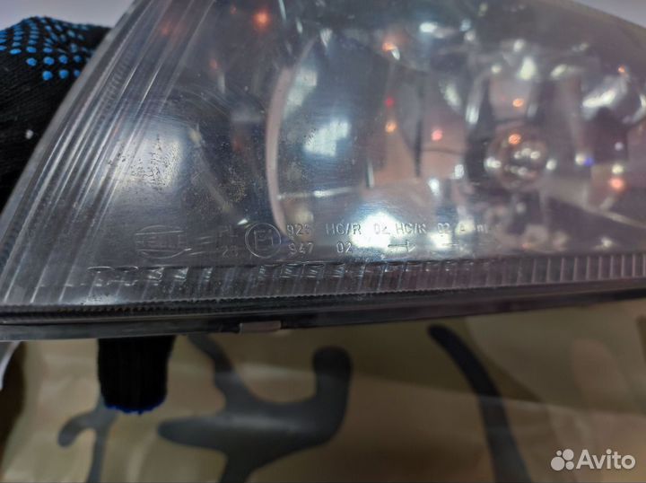 Фара Mitsubishi Carisma передняя левая