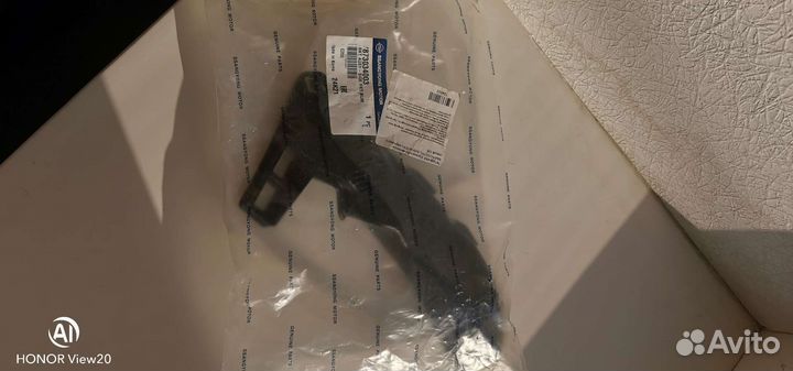 Кронштейн переднего бампера левый