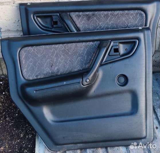 Обшивка дверей на Волгу 31105