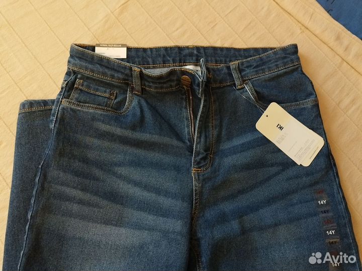 Джинсы новые 158