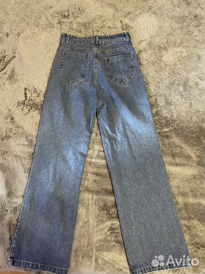 Джинсы клеш