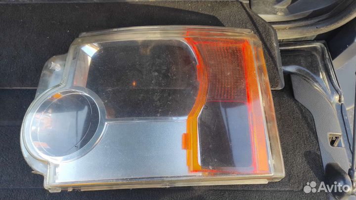 Стекло левой фары Дискавери 3