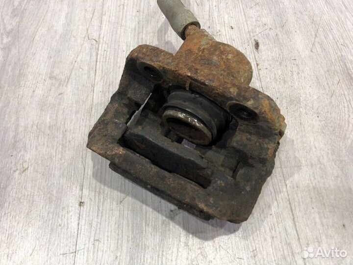 Суппорт тормозной передний левый Renault Symbol