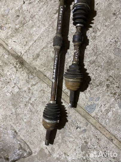 Привод левый Mitsubishi Lancer 9 1.6 МКПП