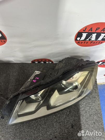 Фара левая Volkswagen Passat B7