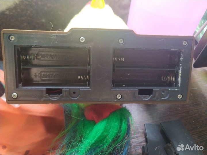 Игрушка попугай-повторюшка