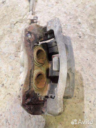 Суппорт тормозной передний Актион Нью Actyon New