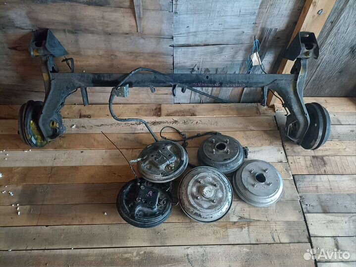 Задняя балка Mazda demio