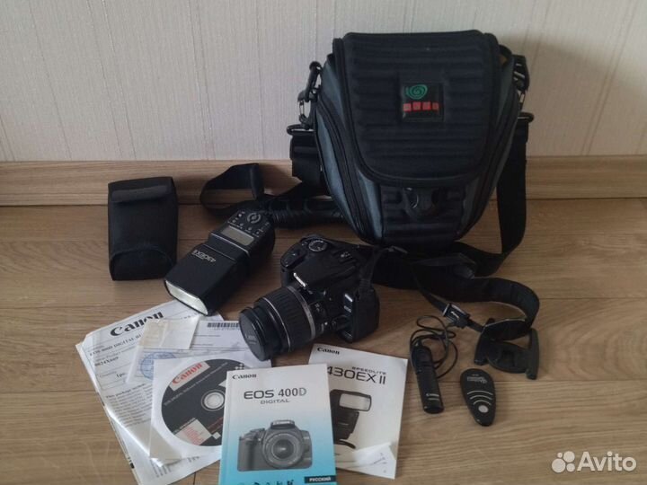 Фотоаппарат и вспышка Canon