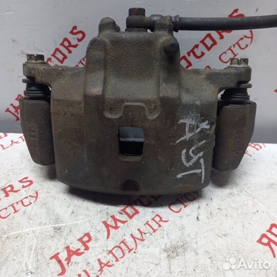 Суппорт тормозной передний Mitsubishi Outlander