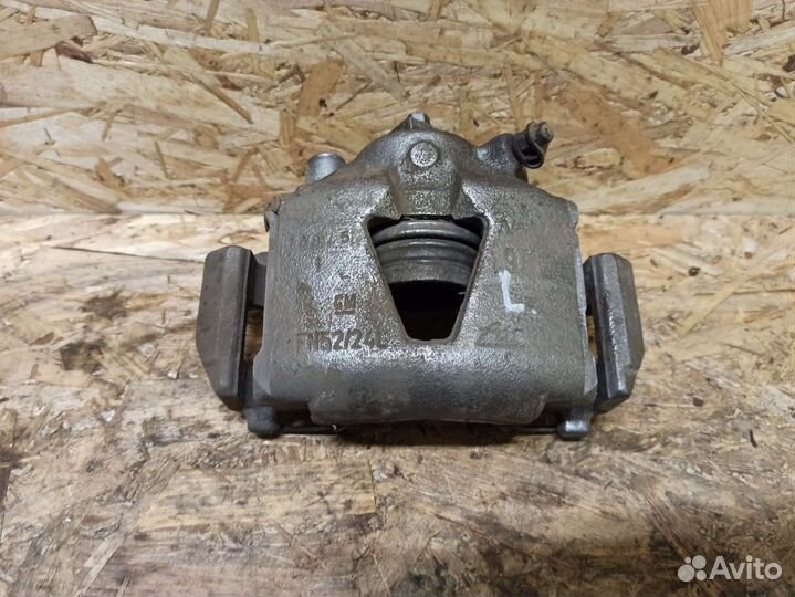 Суппорт передний левый Opel Astra F