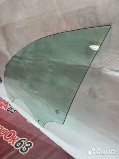 Стекло двери переднее левое Audi A4