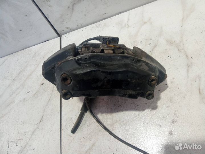 Суппорт тормозной передний левый Mercedes-Benz