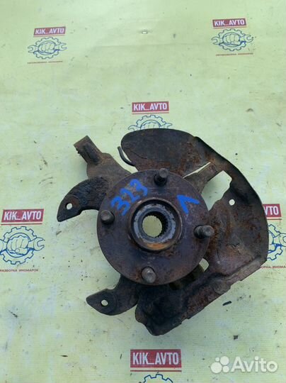 Кулак поаоротный левый Mazda 323 f