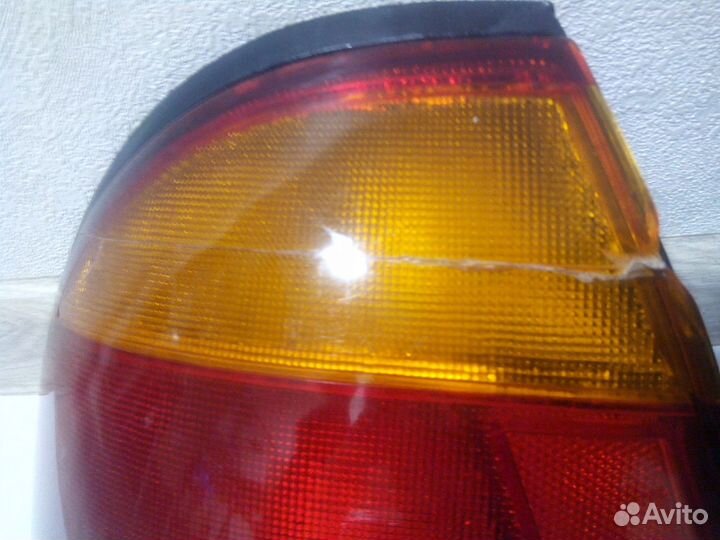 Фонари задние правы и левый Mazda 323 BA (1994—200