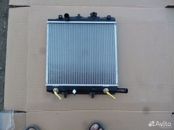 Радиатор Mazda Demio