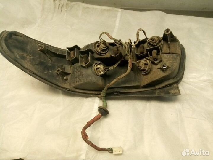 Фонарь задний левый Toyota Curren ST206 3SFE